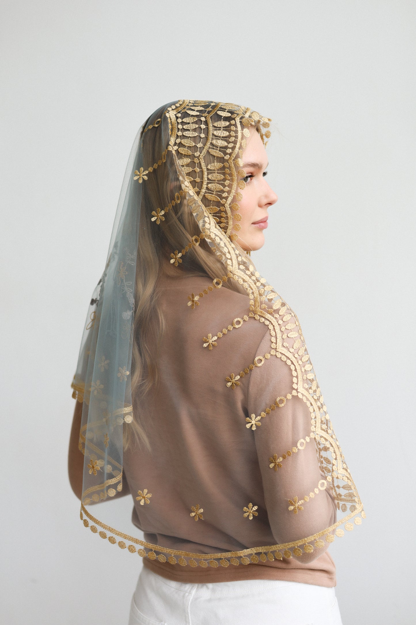 MANTILLA WITH JESUS ON THE BACK